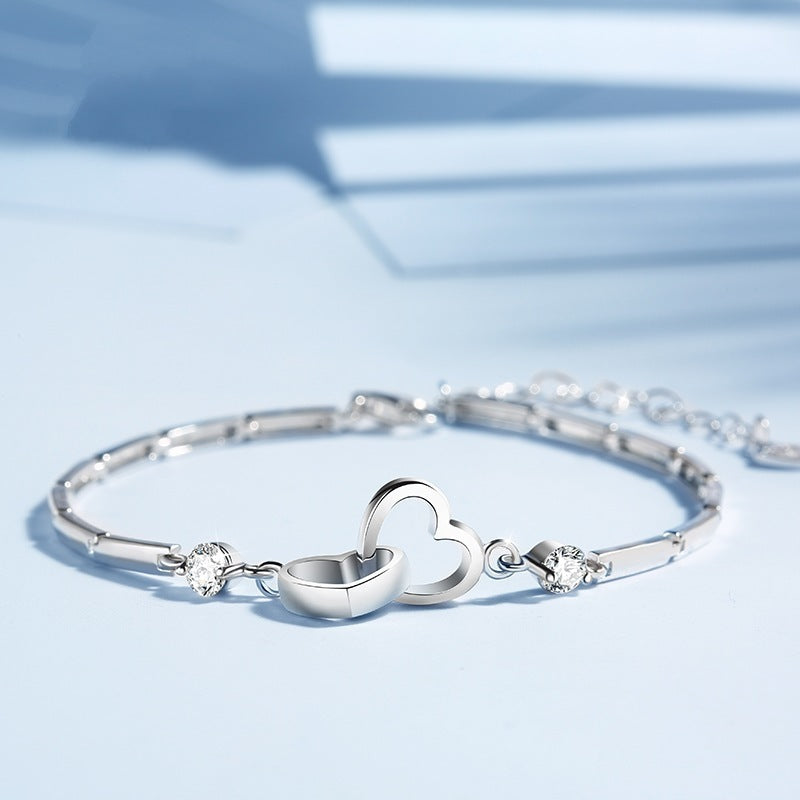 Interlocking Hearts Crystal Accent Bracelet in Sterling Silver