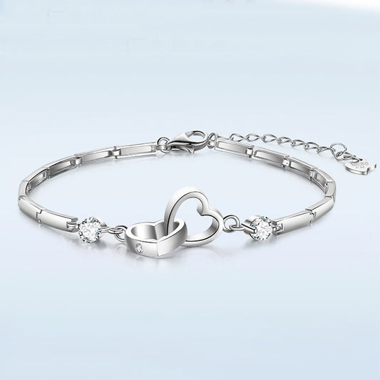 Interlocking Hearts Crystal Accent Bracelet in Sterling Silver