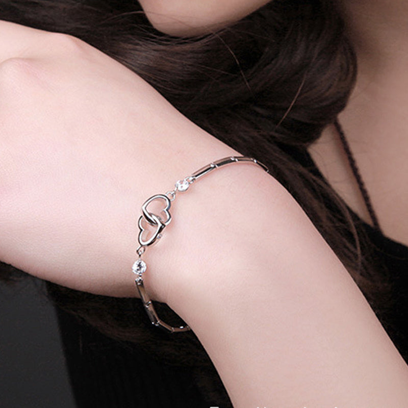 Interlocking Hearts Crystal Accent Bracelet in Sterling Silver